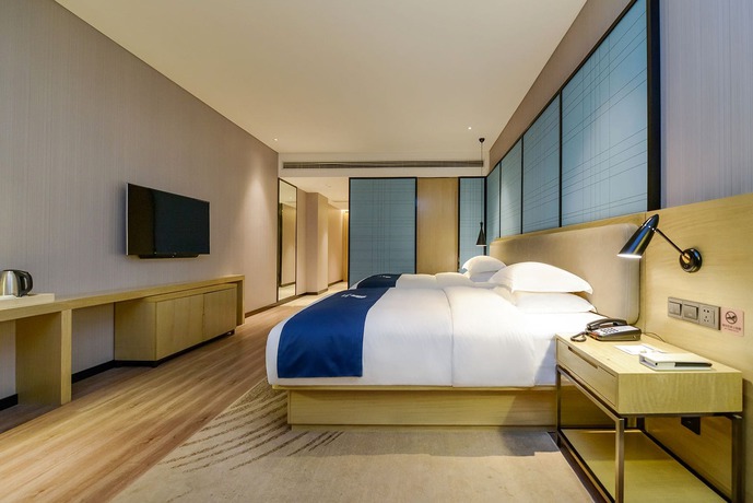 Imagen de la habitación del Hotel City Comfort Inn Maoming Railway Station Wenming R. Foto 3