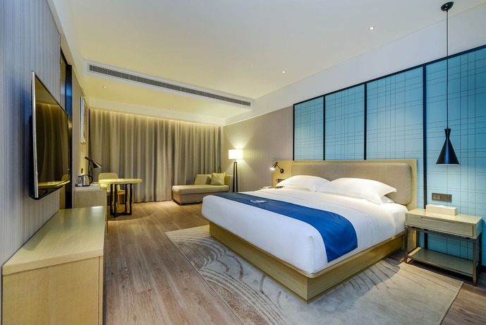 Imagen de la habitación del Hotel City Comfort Inn Maoming Railway Station Wenming R. Foto 4