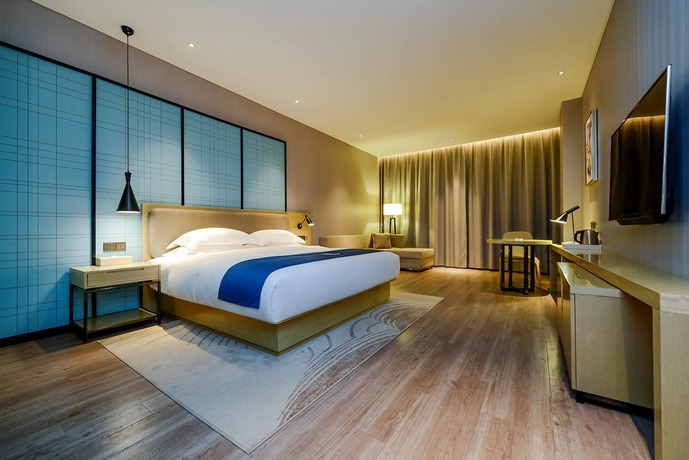 Imagen de la habitación del Hotel City Comfort Inn Maoming Railway Station Wenming R. Foto 9