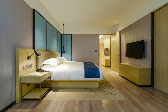 Imagen de los interiores del Hotel City Comfort Inn Maoming Railway Station Wenming R. Foto 17