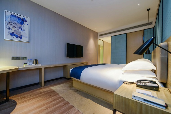 Imagen de los interiores del Hotel City Comfort Inn Maoming Railway Station Wenming R. Foto 18