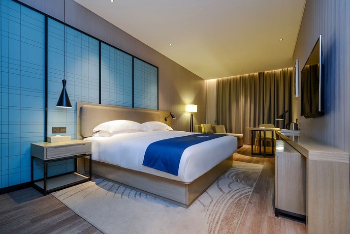 Imagen de la habitación del Hotel City Comfort Inn Maoming Railway Station Wenming R. Foto 10
