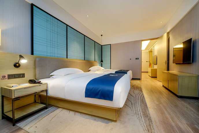Imagen de los interiores del Hotel City Comfort Inn Maoming Railway Station Wenming R. Foto 19