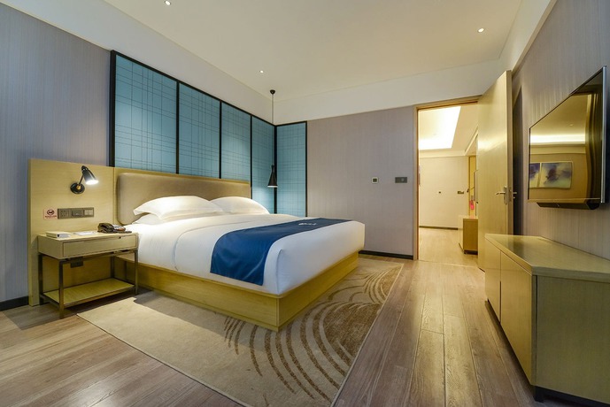Imagen de los interiores del Hotel City Comfort Inn Maoming Railway Station Wenming R. Foto 20