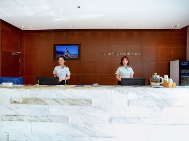 Imagen de los interiores del Hotel City Comfort Inn Xianning South Station. Foto 16