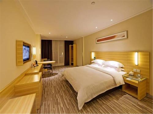 Imagen de la habitación del Hotel City Comfort Inn Zhongshangang Avenue. Foto 8