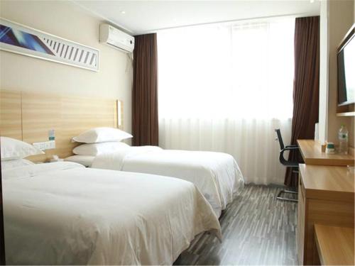 Imagen general del Hotel City Comfort Inn Zhongshangang Avenue. Foto 5