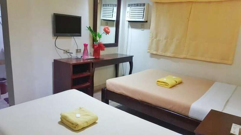 Imagen de la habitación del Hotel City Corporate Inn. Foto 12
