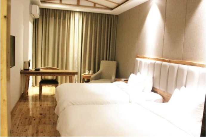 Imagen de la habitación del Hotel City Cottage Tidu Rd Branch. Foto 16