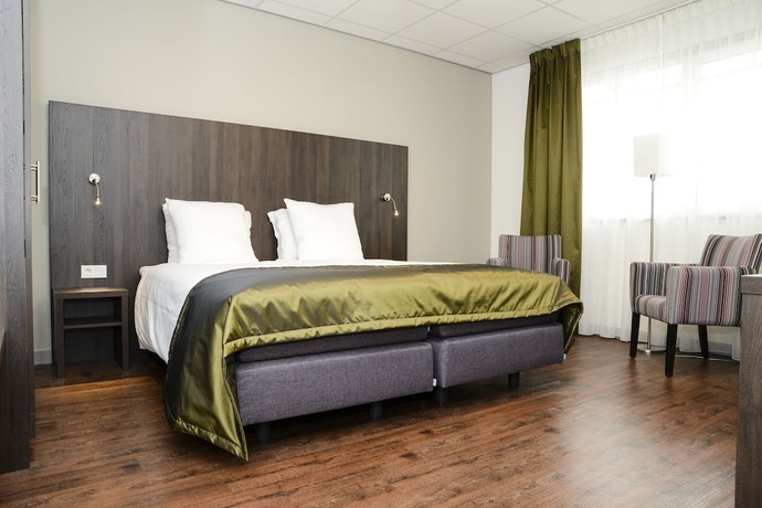 Imagen de la habitación del Hotel City De Jonge. Foto 13