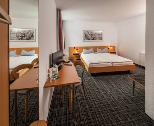 Imagen de la habitación del Hotel City, Eisenach. Foto 2