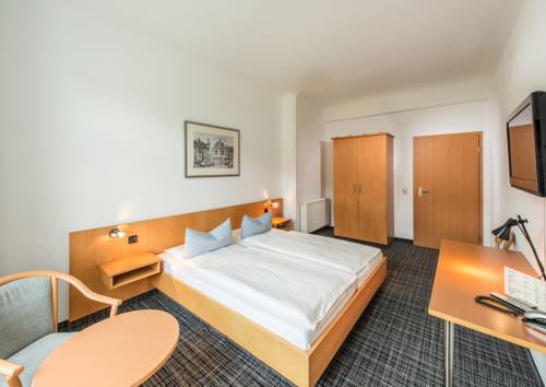 Imagen de la habitación del Hotel City, Eisenach. Foto 3