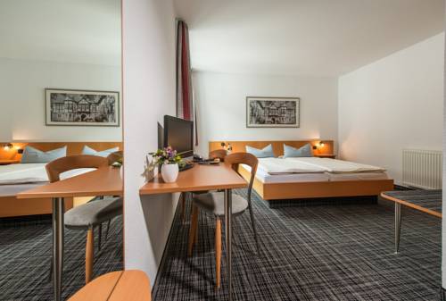Imagen de la habitación del Hotel City, Eisenach. Foto 6
