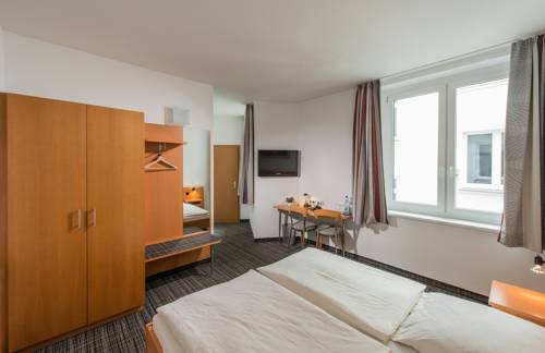 Imagen de la habitación del Hotel City, Eisenach. Foto 7
