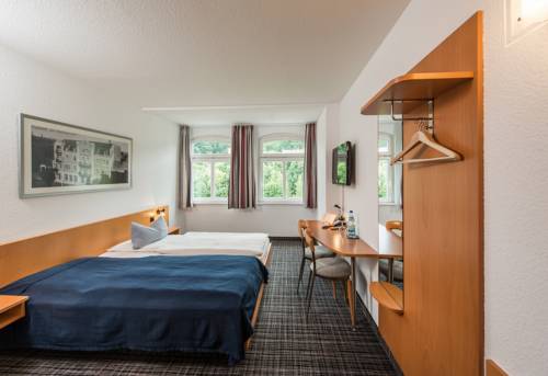 Imagen de la habitación del Hotel City, Eisenach. Foto 9