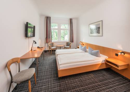 Imagen de la habitación del Hotel City, Eisenach. Foto 10