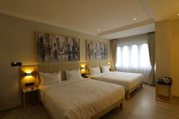 Imagen de la habitación del Hotel City Express By Downtown Udaipur. Foto 15