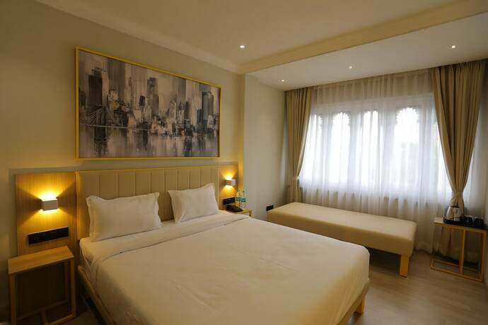 Imagen de la habitación del Hotel City Express By Downtown Udaipur. Foto 16