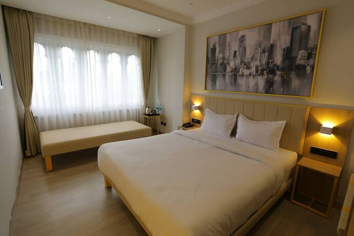 Imagen de la habitación del Hotel City Express By Downtown Udaipur. Foto 18