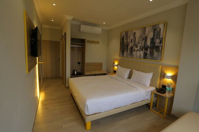 Imagen de la habitación del Hotel City Express By Downtown Udaipur. Foto 19