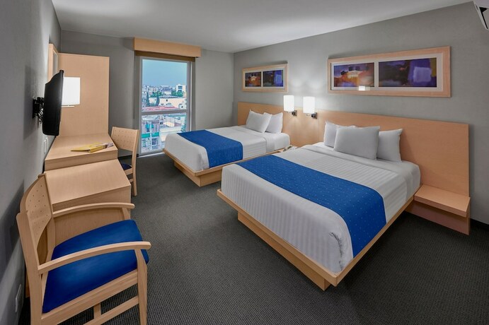 Imagen de la habitación del Hotel City Express By Marriott Apizaco. Foto 15