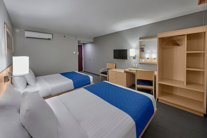 Imagen de la habitación del Hotel City Express By Marriott Apizaco. Foto 19