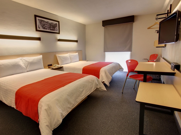 Imagen de la habitación del Hotel City Express By Marriott Cancun. Foto 5