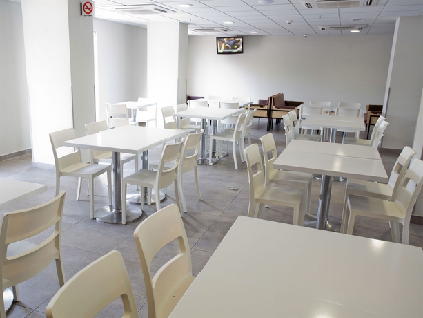 Imagen del bar/restaurante del Hotel City Express By Marriott Chetumal. Foto 8