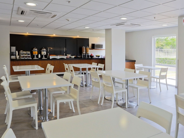 Imagen del bar/restaurante del Hotel City Express By Marriott Chetumal. Foto 10