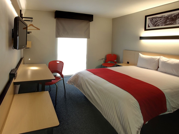 Imagen de la habitación del Hotel City Express By Marriott Durango. Foto 7