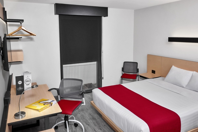 Imagen de la habitación del Hotel City Express By Marriott Guadalajara Aeropuerto. Foto 9