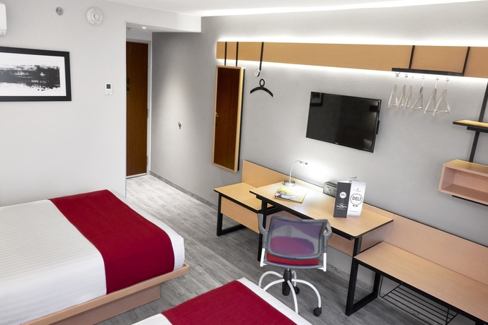 Imagen de la habitación del Hotel City Express By Marriott Guadalajara Aeropuerto. Foto 10