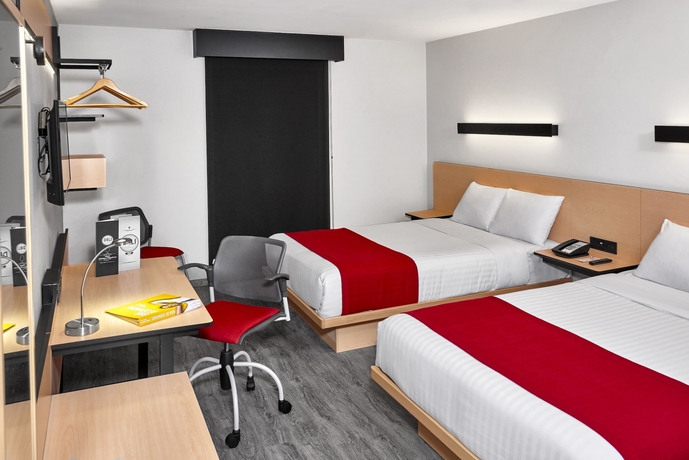 Imagen de la habitación del Hotel City Express By Marriott Guadalajara Aeropuerto. Foto 11