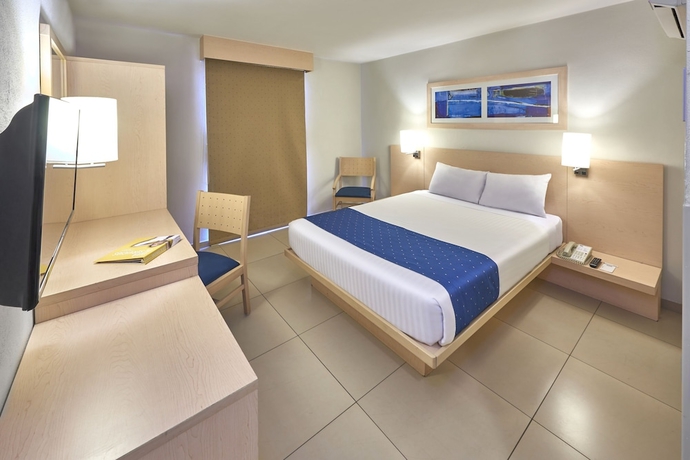 Imagen de la habitación del Hotel City Express By Marriott Manzanillo. Foto 6