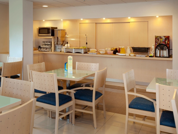 Imagen del bar/restaurante del Hotel City Express By Marriott Minatitlan. Foto 3