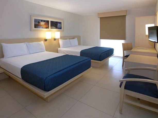 Imagen de la habitación del Hotel City Express By Marriott Playa Del Carmen. Foto 8