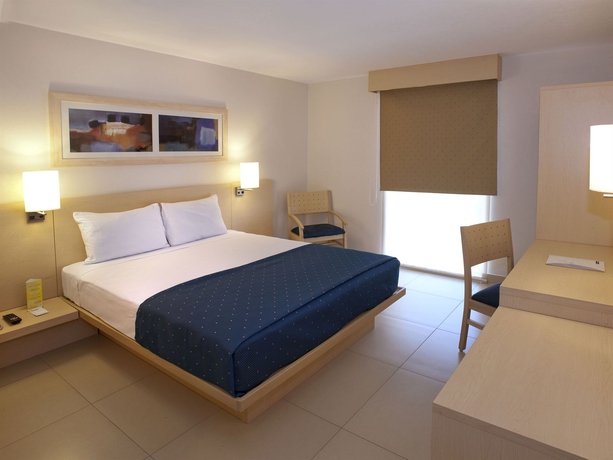 Imagen de la habitación del Hotel City Express By Marriott Playa Del Carmen. Foto 9