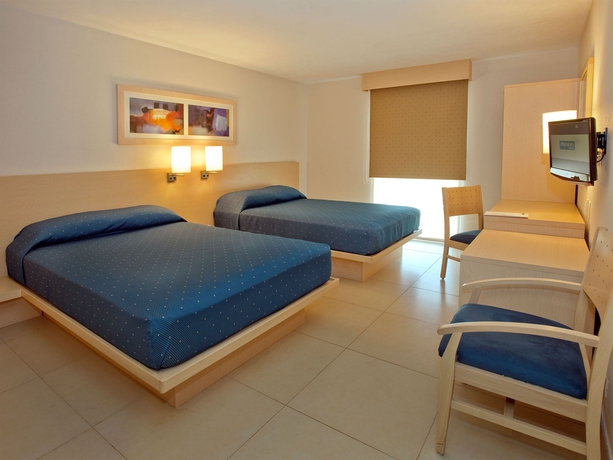 Imagen de la habitación del Hotel City Express By Marriott Playa Del Carmen. Foto 10