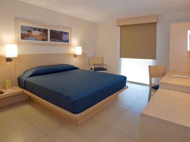 Imagen de la habitación del Hotel City Express By Marriott Playa Del Carmen. Foto 11