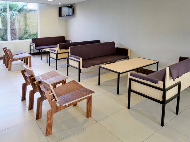 Imagen de los interiores del Hotel City Express By Marriott Quer&eacute;taro Jur&iacute;ca. Foto 12