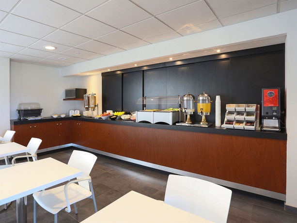 Imagen del bar/restaurante del Hotel City Express By Marriott Salina Cruz. Foto 2