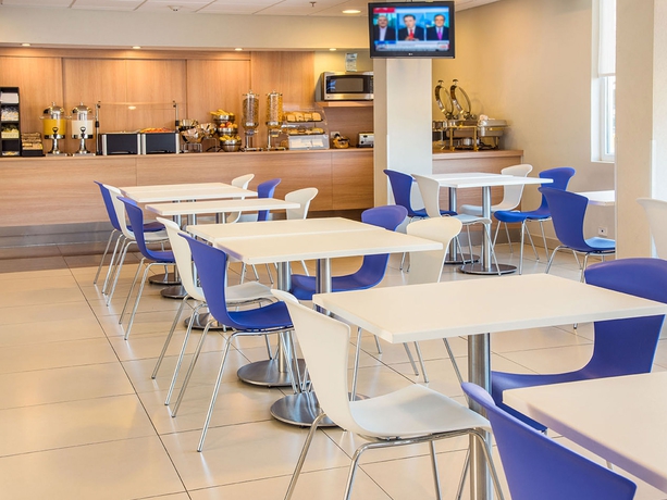 Imagen del bar/restaurante del Hotel City Express By Marriott San Jose Costa Rica. Foto 6