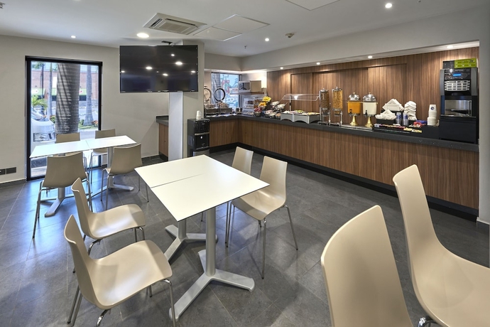 Imagen del bar/restaurante del Hotel City Express By Marriott Tampico. Foto 4