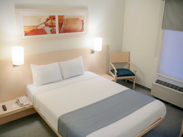 Imagen de la habitación del Hotel City Express By Marriott Tula. Foto 4