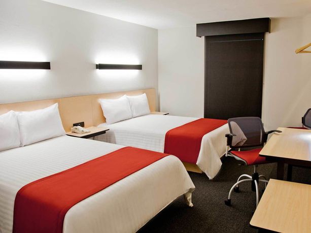 Imagen de la habitación del Hotel City Express Cdmx Plaza Central. Foto 8