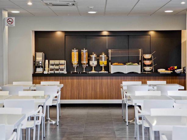 Imagen del bar/restaurante del Hotel City Express Cdmx Plaza Central. Foto 4