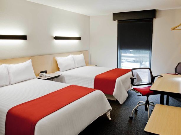 Imagen de la habitación del Hotel City Express Cdmx Plaza Central. Foto 10