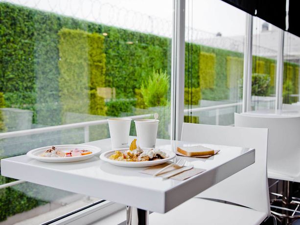 Imagen del bar/restaurante del Hotel City Express Cdmx Plaza Central. Foto 5