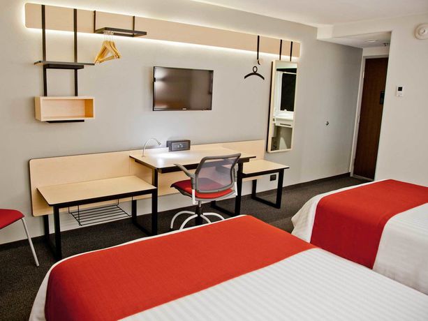 Imagen de la habitación del Hotel City Express Cdmx Plaza Central. Foto 11