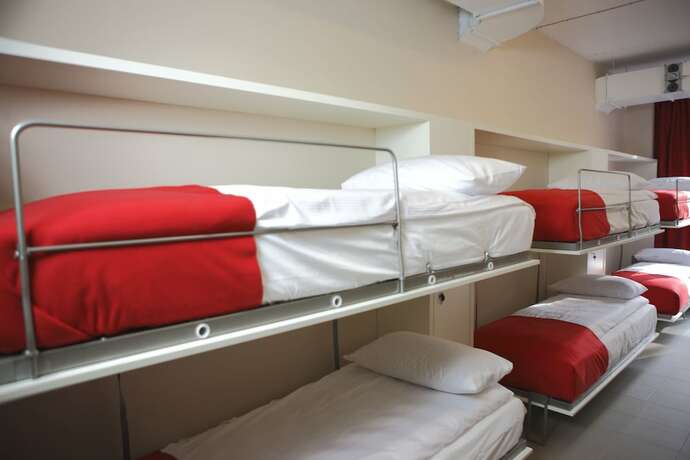 Imagen de la habitación del Hotel City Express Hostel. Foto 13